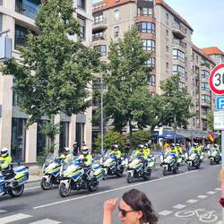 Police escort for some diplomat past checkpoint charlie