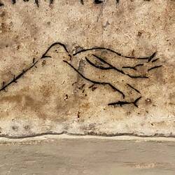 Carving of the dove of peace