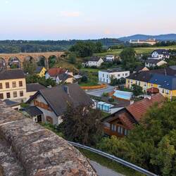 There is Melk Abbey in the background across the river