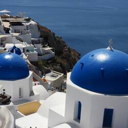 Iconic view of the blue and white buildings honoring colors of Greek flag.