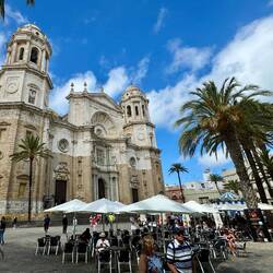 Cafes in front of the Cathedral of the Holy Cross over the Waters (built in 18th century).