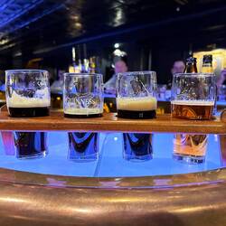 Storehouse tour pours. Another pint was also included and two vouchers for more pints.