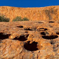 Itjaritjariku Yuu ... holes tunneled out by the mole woman during Creation Time — Mala Walk.