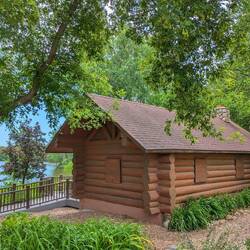 A reconstructed log cabin, from the Gilfillan Family.