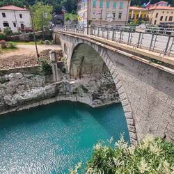 Soca village stone arch bridge