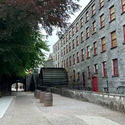 The water wheel that would power the grinders, located in the attached building.