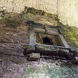 The fireplace in the entertainment hall. The floor was wood - you can see where it was held up.