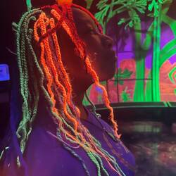 Glow in the dark braids at Omega Mart