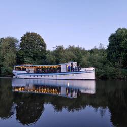 The River King trip boat on an evening cruise