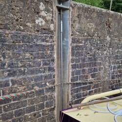 Vertical steel rope inside the lock to keep boats from being banged about