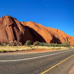 Uluru from the road that circumnavigates it — Uluru-Kata Tjuta NP, NT.