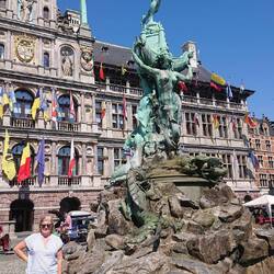 The statue of Brabo throwing away the giants hand in Grote Markt Antwerp