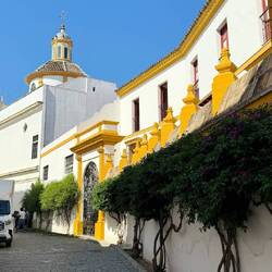 Outside of the bullring, a beautiful building.