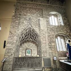 The tan plaster was added in the 50s. It is slowly destroying the medieval-era stone underneath.