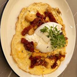 Another omelet, this one with burrata, sun dried tomatoes and cashews.