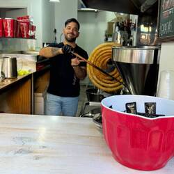 Churros in the making. They are not covered in sugar like in the us.