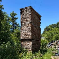 Lumber stacked precariously high
