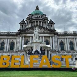 City Hall with a statue of Queen Victoria.