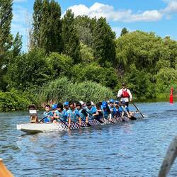 Group of boys practice rowing