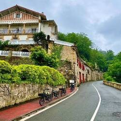 This is a gorgeous neighborhood we ride through (going up a big hill). House looked Bavarian to us.