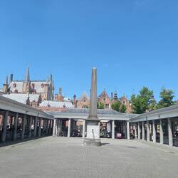 The old fish market site backed by heaps of Spires, Bruges, Belgium.