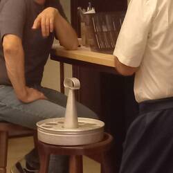 Köbes with his kranz ( klosch glass holder.)