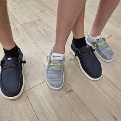 My shoes are the grey ones and Papa's are the black ones