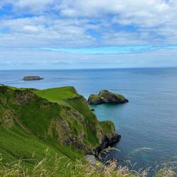 The rope bridge connects that small island with the cliffs next to it.