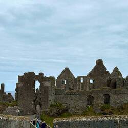 Dunluce Castle. It was abandoned when part of it slid into the sea.