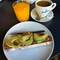 Yummy avocado toast, fresh squeezed orange juice and coffee at our rest stop