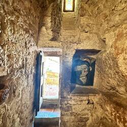 These doorways are WEE. I had to bend almost in half. This is near the grotto where SF slept.