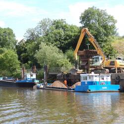 Working barges- notice the difference in height above the water laden and unladen!