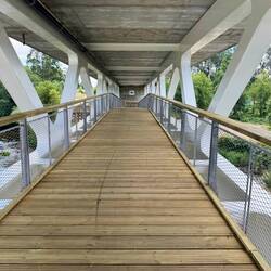 Pilgrim walking bridge under the car bridge
