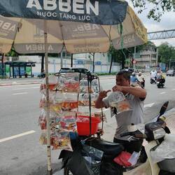 Selling goldfish by the side of the road