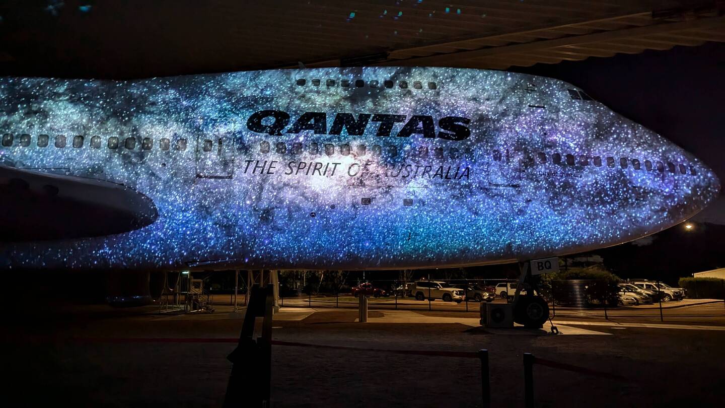 Presentation projected onto the side of the 747-200