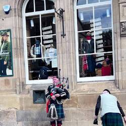 The bagpiper, one of many.