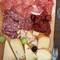 Sausage and cheese and wine for lunch