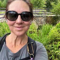 Me, standing in front of a very old bridge