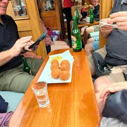 Bitter balls, like arancini, served with the Dutch version of rocket fuel shot. Genever