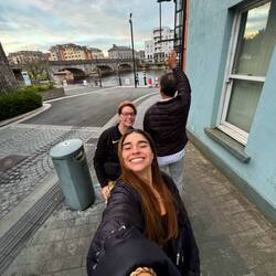 Apparently the camera was behind me, and we weren't just waving to people passing by on the bridge.