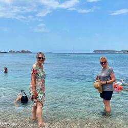 Dipping out feet into the water - stony