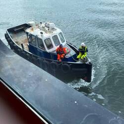 Leaving Invergordon. Pilot boat just leaving ship.