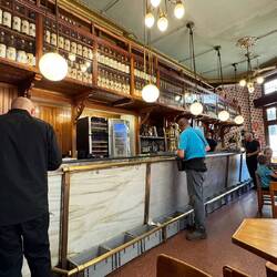 Notice the grey containers on the floor in front of the bar, they are for tossing shells, trash, etc