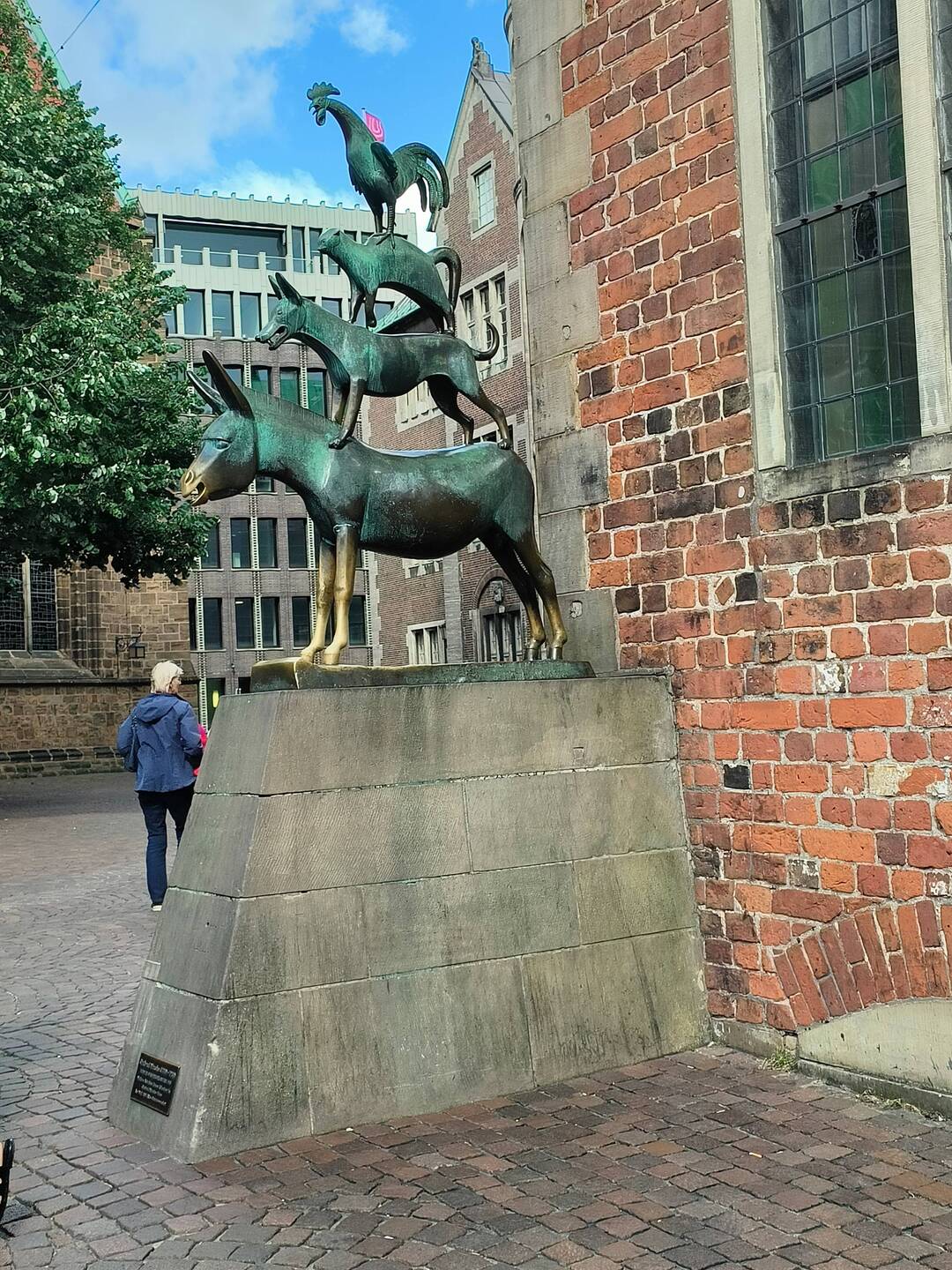 The famous Musicians of Bremen statue. People rub it, hence the golden bits.