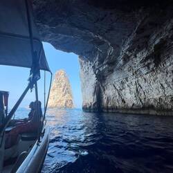 Boating in caves in Paxos