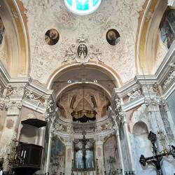 This weird little church's skeleton decorations have something to do with pirates.