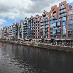 The pedestrian walkway along the river is littered with cafes & restaurants