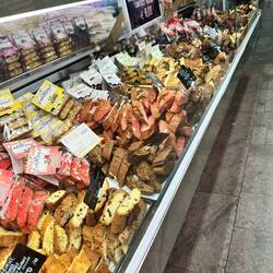 Back in town we walked through a food market. This stall is all biscotti. !!
