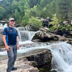 The fourth waterfall looks like steps, with water flowing along the large granite slabs