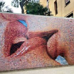 A beautiful mural called The Kiss - is made of many small photographs of people's moments of love